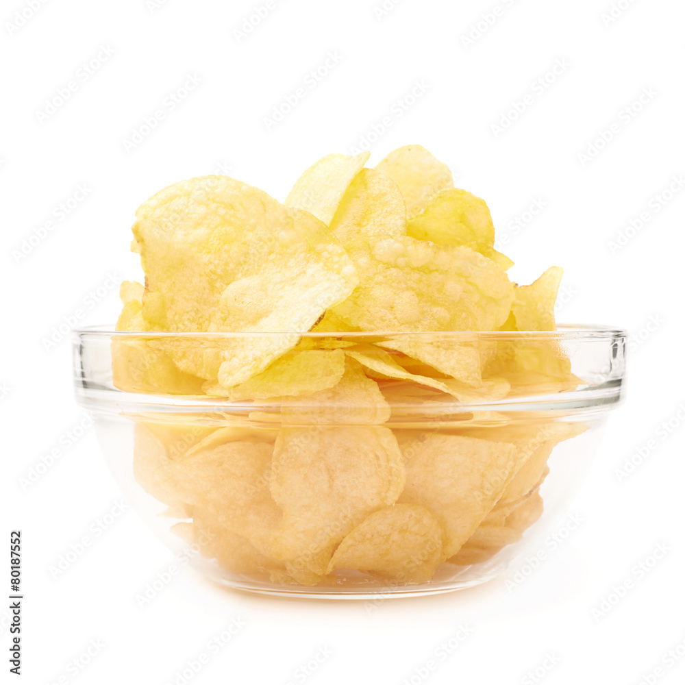 Multiple potato chips in a glass bowl Multiple potato chips in a glass bowl