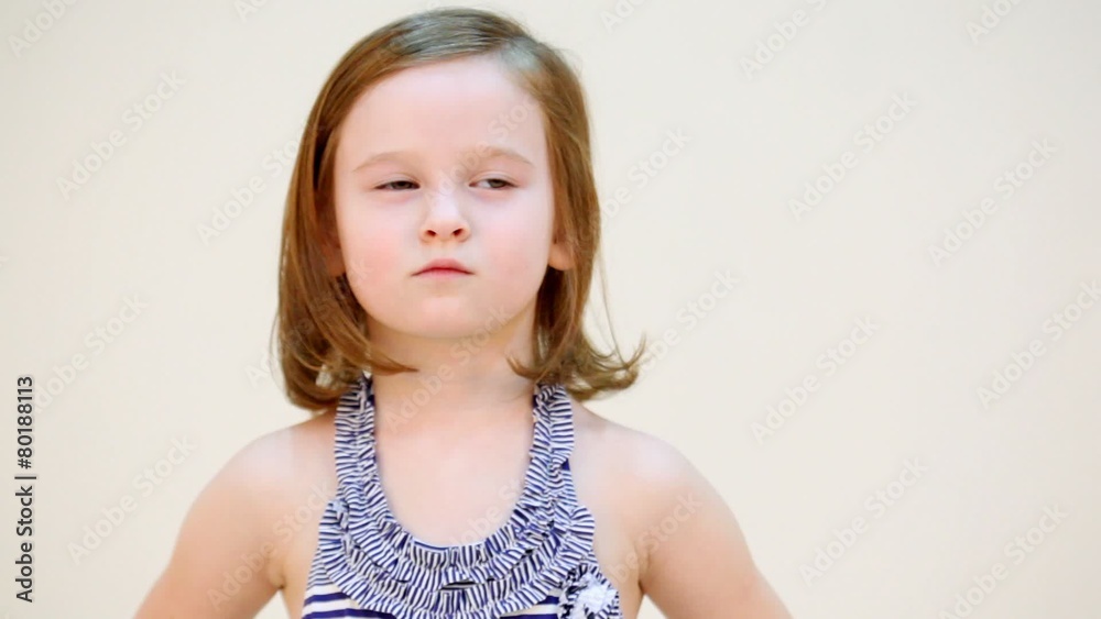 Little girl in swimsuit isolated on white zoom