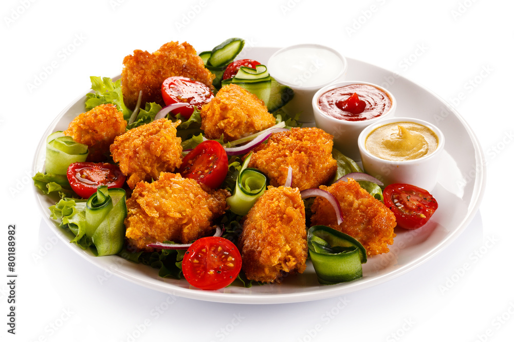 Fried chicken nuggets and vegetables Fried chicken nuggets and vegetables