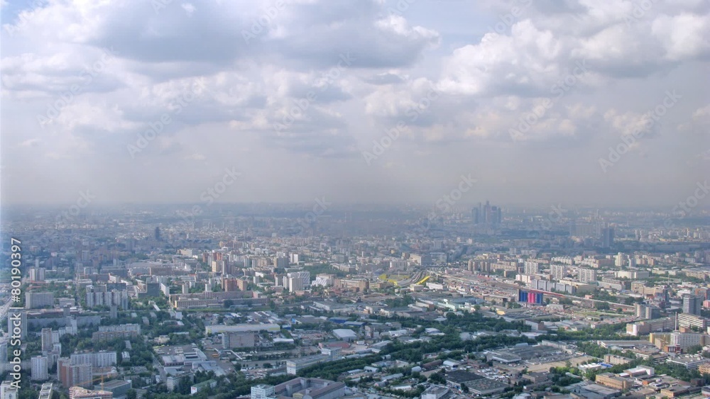White clouds float over residential area of Moscow in afternoon, time lapse White clouds float over residential area of Moscow in afternoon, time lapse