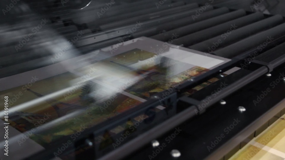 Huge printing head creates image on paper in machine during 23rd exhibition Polygraphinter Huge printing head creates image on paper in machine during 23rd exhibition Polygraphinter
