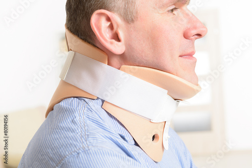 Man in cervical collar