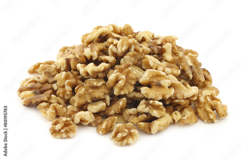 fresh peeled walnuts on a white background fresh peeled walnuts on a white background