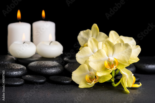 beautiful spa concept of yellow orchid phalaenopsis and candles