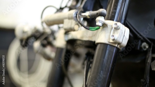 Wallpaper Mural Front fork of modern motor bike overview at service station Torontodigital.ca