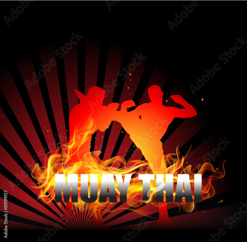 Thai Boxing with fighter on fire background photo