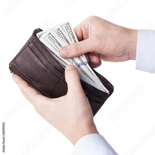 Taking money from wallet - Stock Image
