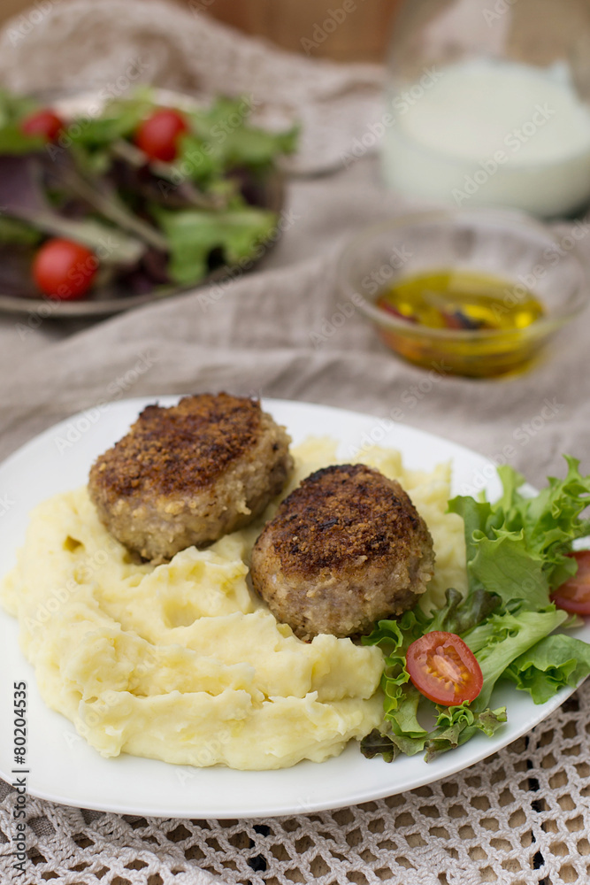 Meatballs cutlets with mashed potatoes and salad Meatballs cutlets with mashed potatoes and salad