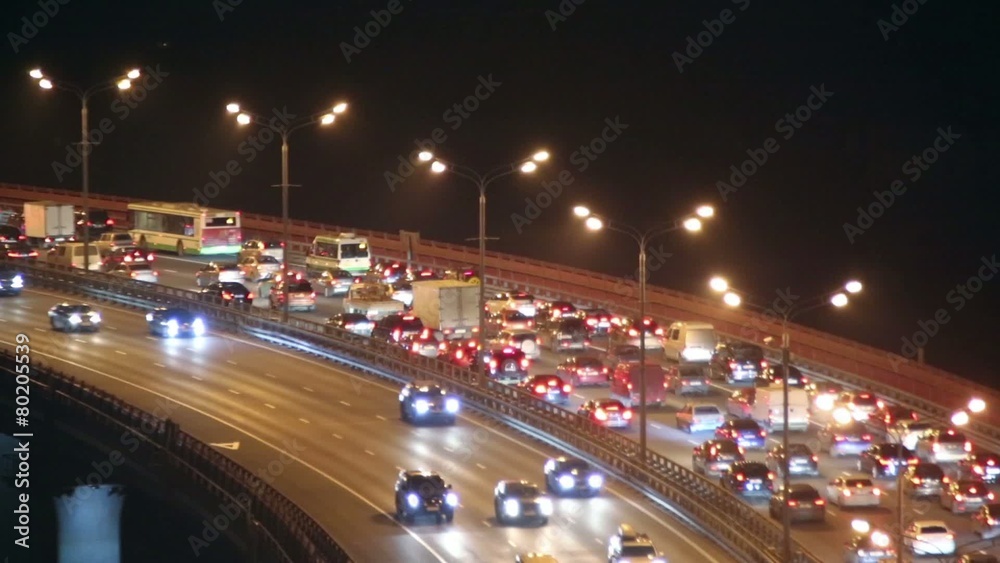 Car traffic jam on bridge highway in the night city Car traffic jam on bridge highway in the night city