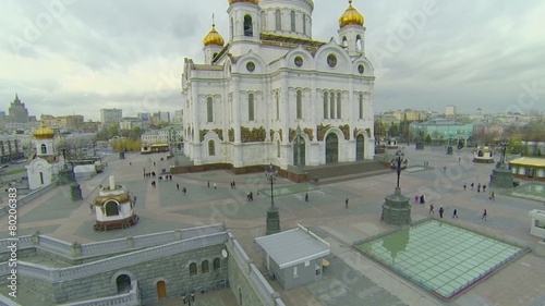 People walk near Christ the Saviour Cathedral