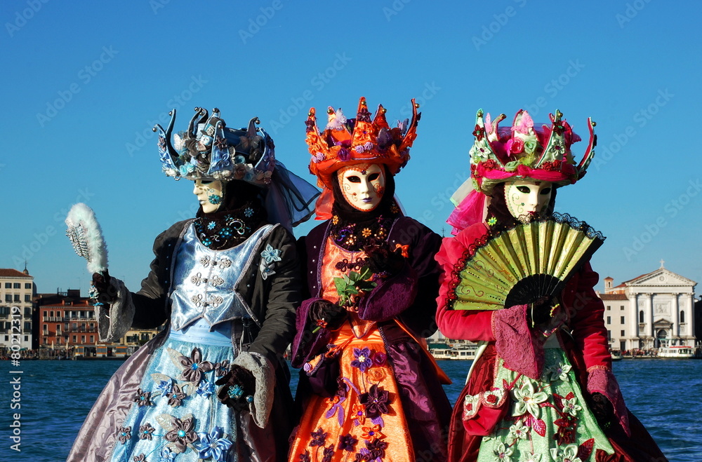 Fototapeta premium Group of people in costumes and masks, Venice carnival