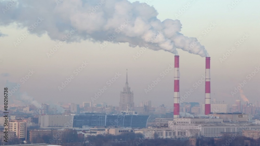 Cityscape of Moscow with smoke goes from tubes of power plant Cityscape of Moscow with smoke goes from tubes of power plant