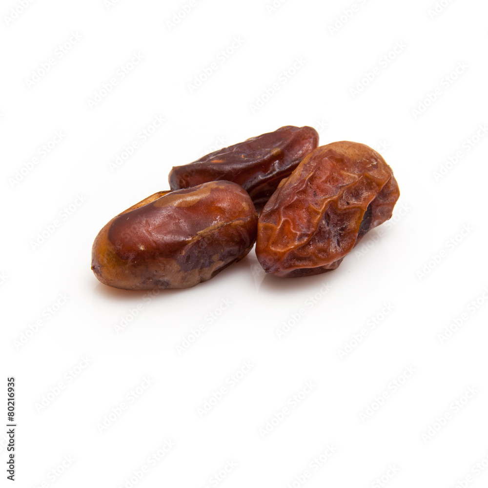 Medjool dates isolated on a white background. Medjool dates isolated on a white background.
