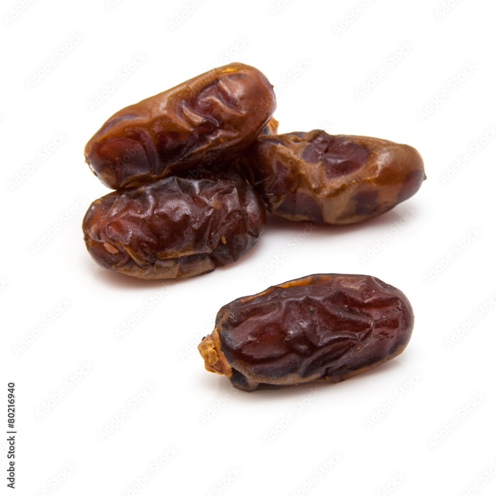 Medjool dates isolated on a white background. Medjool dates isolated on a white background.