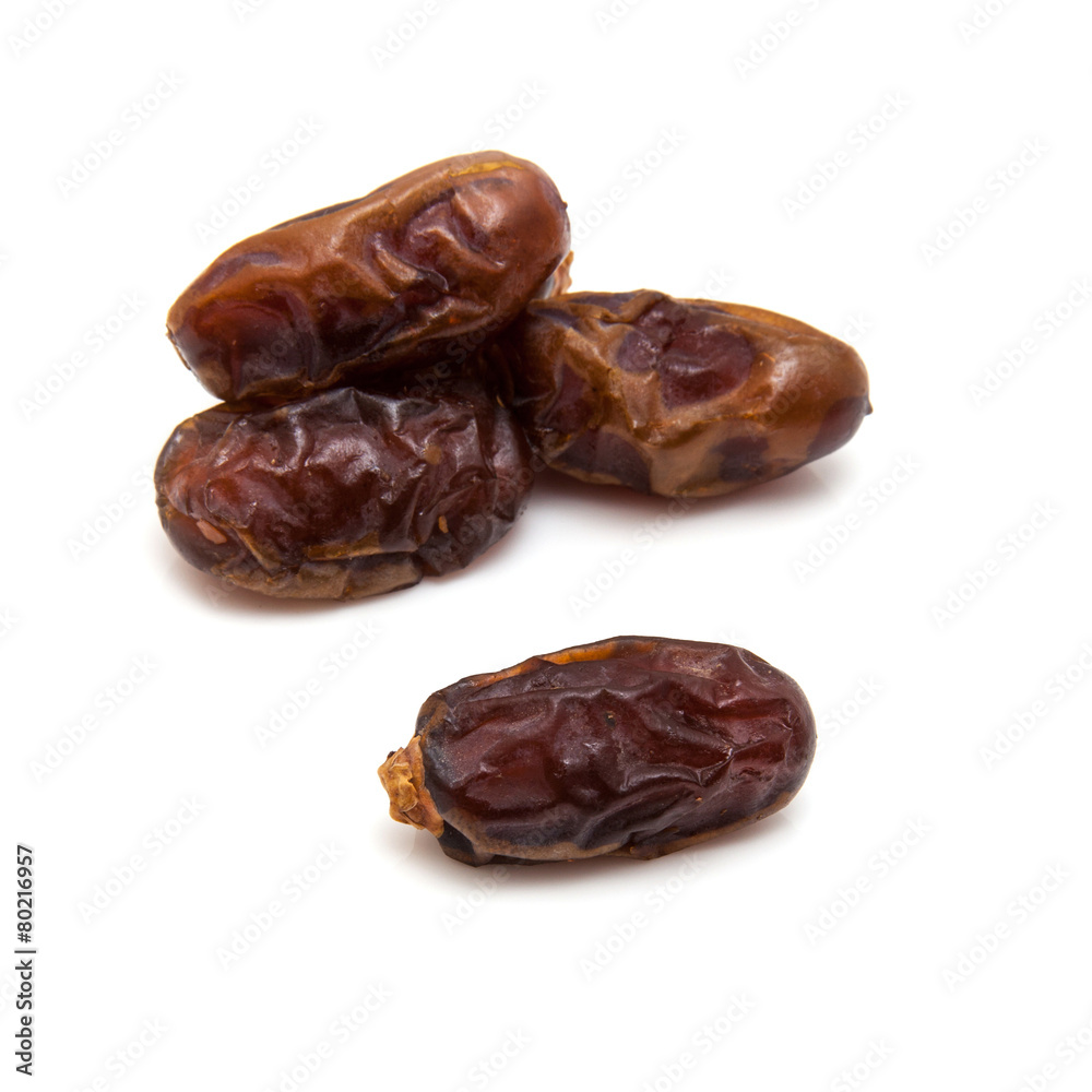 Medjool dates isolated on a white background. Medjool dates isolated on a white background.