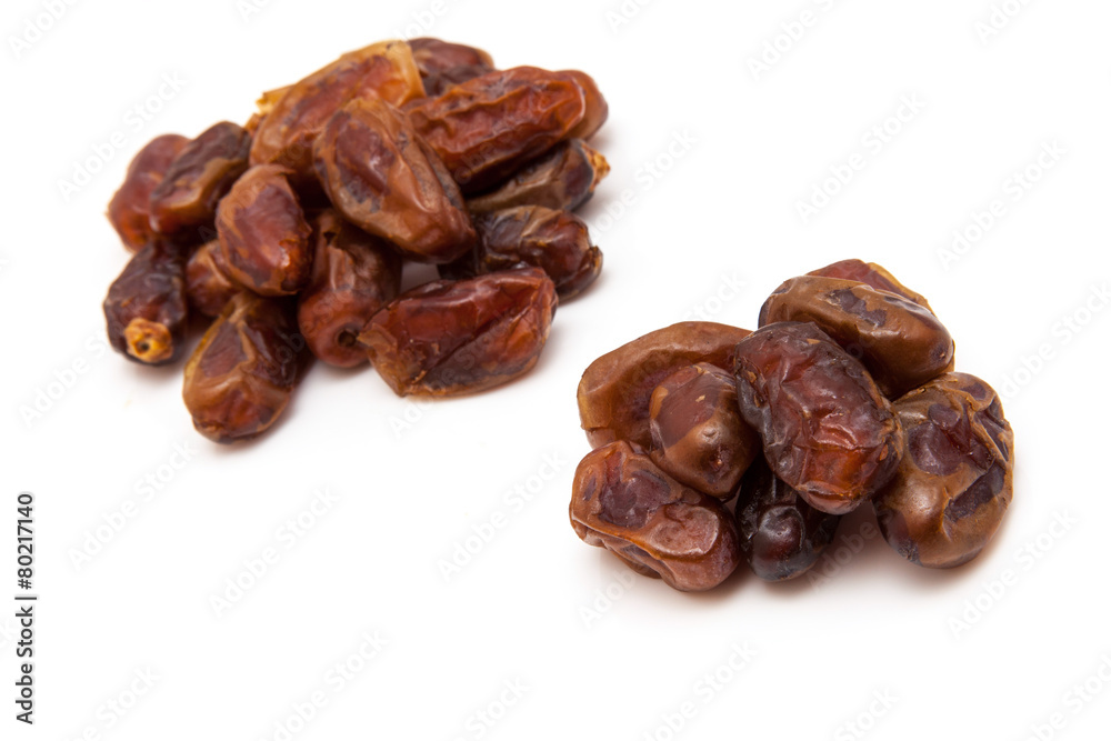 Medjool dates isolated on a white background. Medjool dates isolated on a white background.