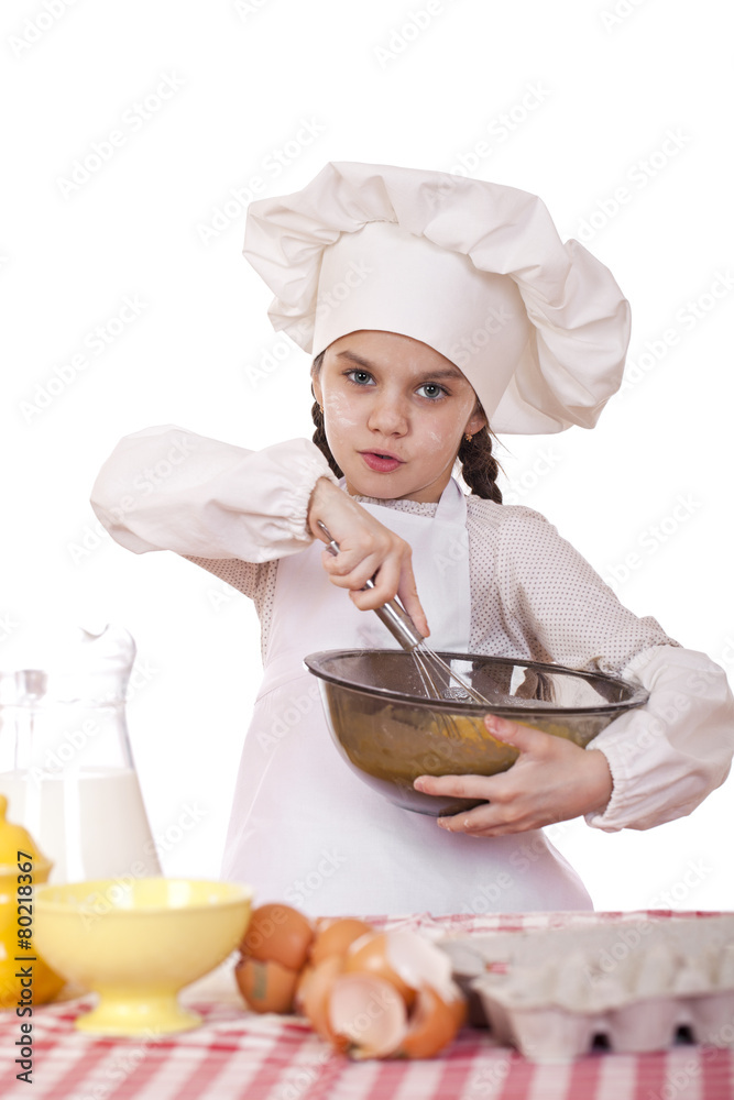 Cooking and people concept - smiling little girl in cook hat Cooking and people concept - smiling little girl in cook hat