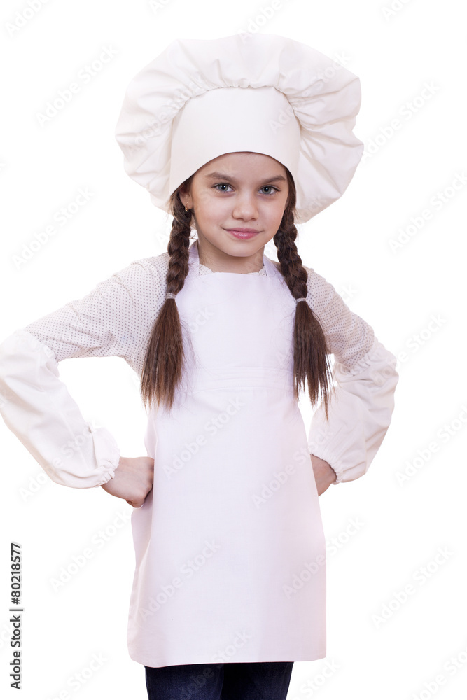 Cooking and people concept - smiling little girl in cook hat