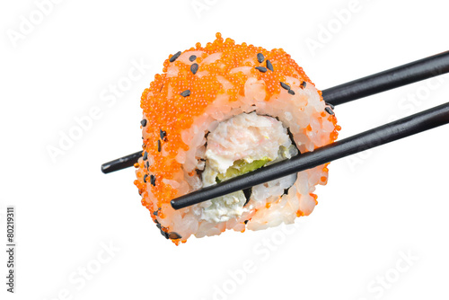 Sushi roll with black chopsticks