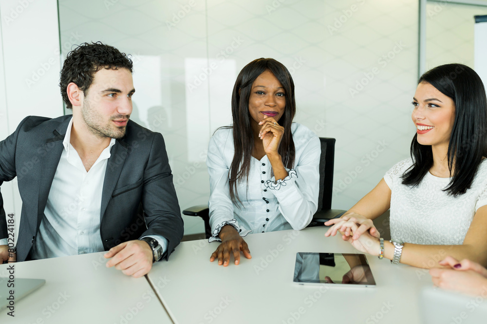 Business talk while sitting at a table and analyzing results Business talk while sitting at a table and analyzing results