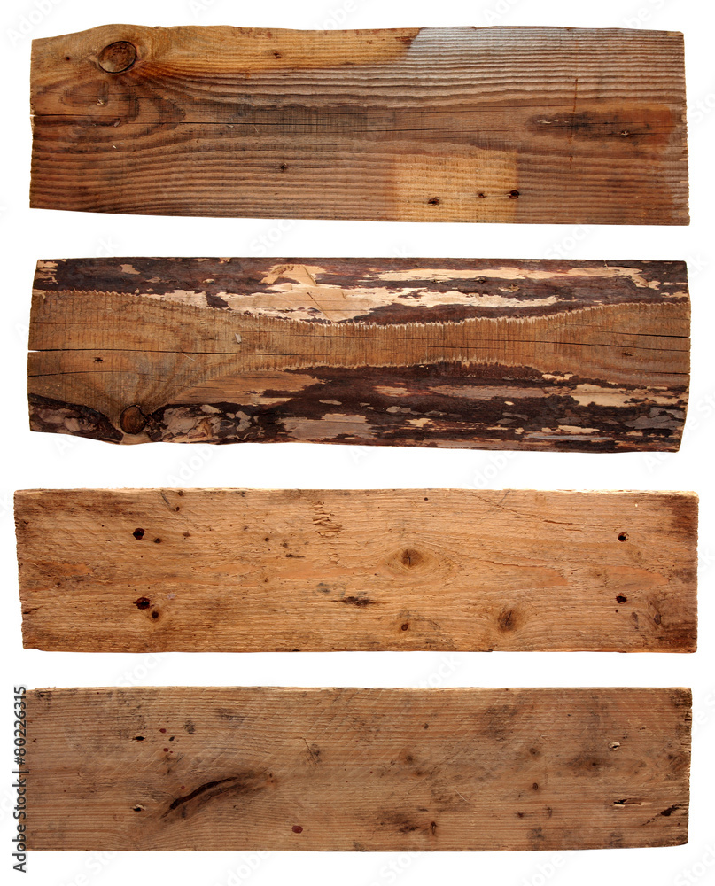 Four old wooden boards isolated on a white background. Old Wood