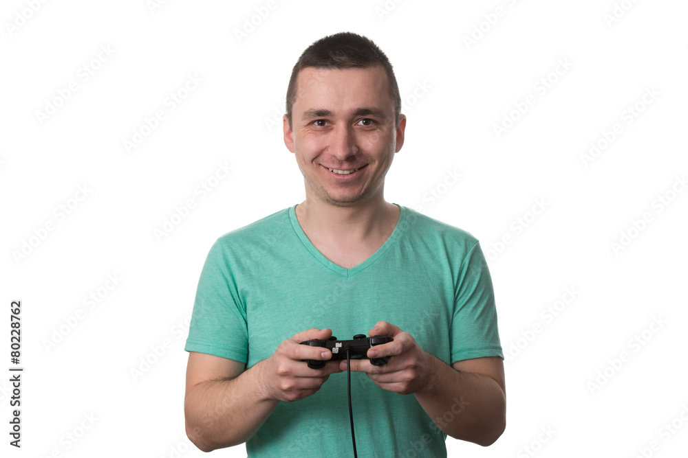 Concentrated Man Playing Video Games On A White Background Concentrated Man Playing Video Games On A White Background