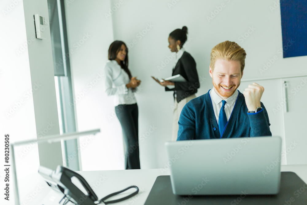 Successful businesman being happy for achieving his goals Successful businesman being happy for achieving his goals