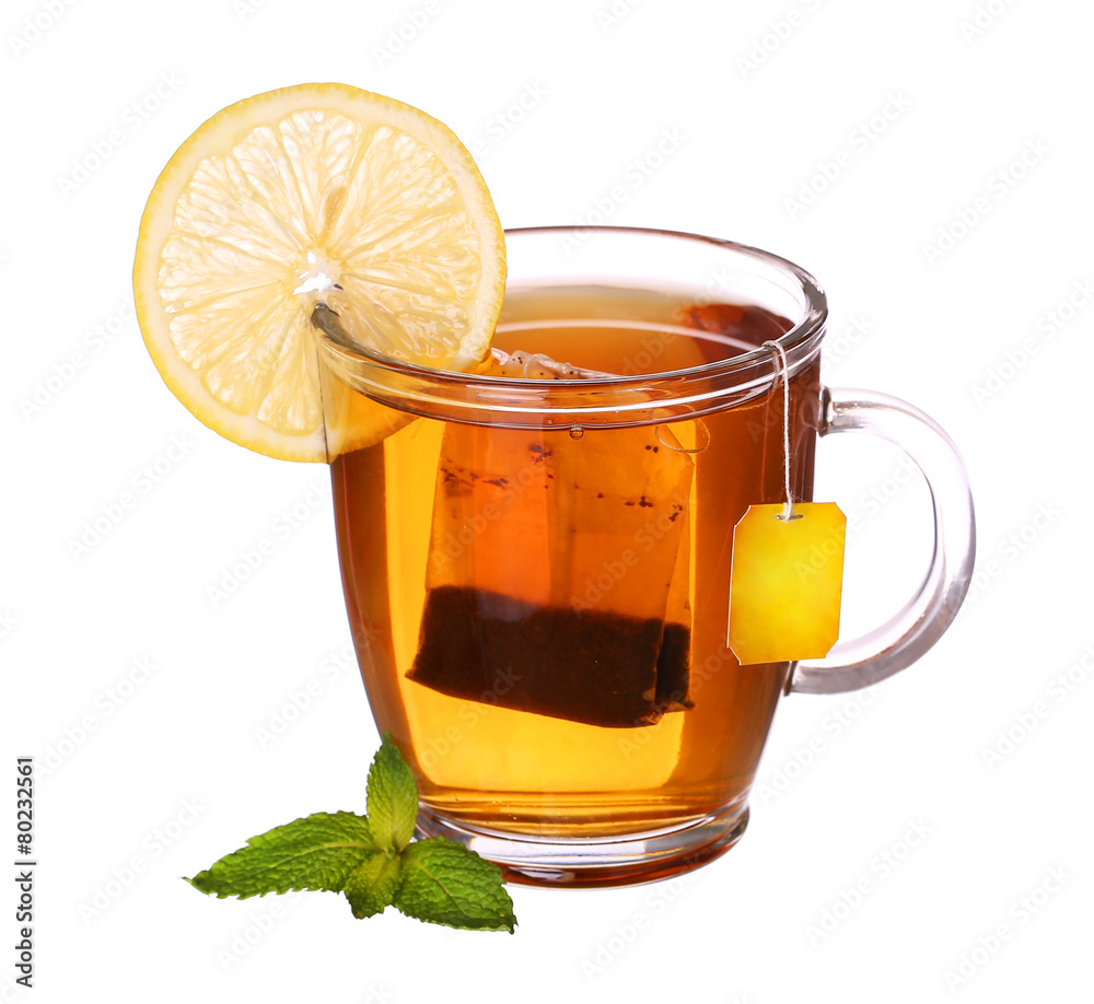 glass cup of tea with lemon and mint isolated on white backgroun