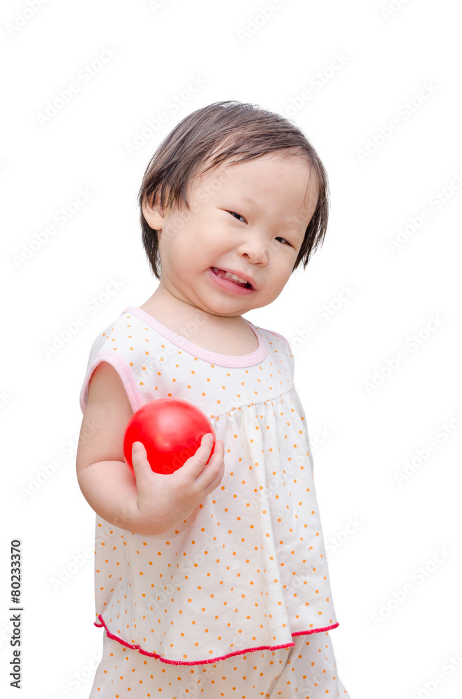 Little asian girl holding red ball over white background