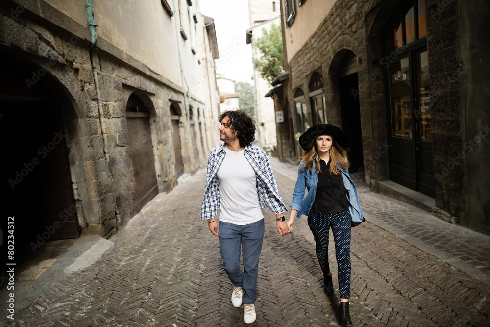 Beautiful couple enjoying themselves in the Italian streets