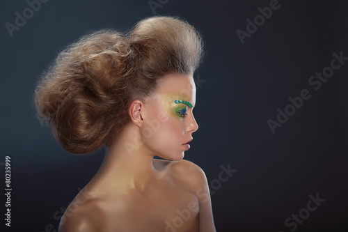 Profile of Fashionable Woman with Creative Make-up