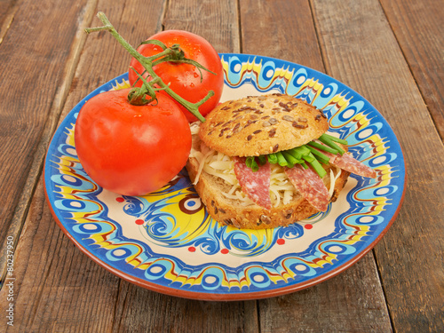 Sandwich with tomatoes on a plate