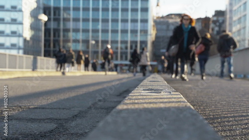 Pedestrians in slow motion in the city. Find similar clips in ou