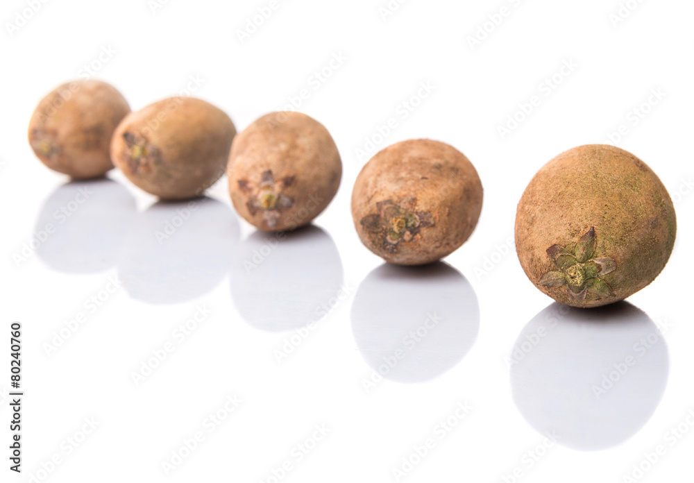 Sapodilla or Ciku fruit over white background Sapodilla or Ciku fruit over white background