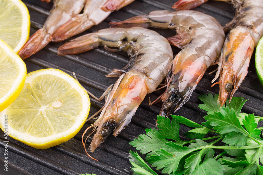 Raw shrimps on pan