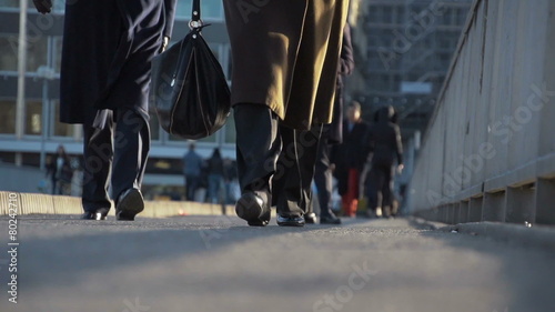 Pedestrians in slow motion in the city. Find similar clips in ou