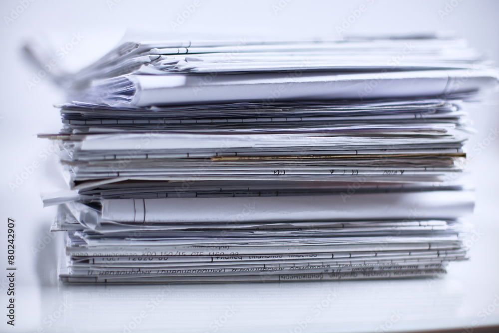 Big stack of papers ,documents on the desk Big stack of papers ,documents on the desk