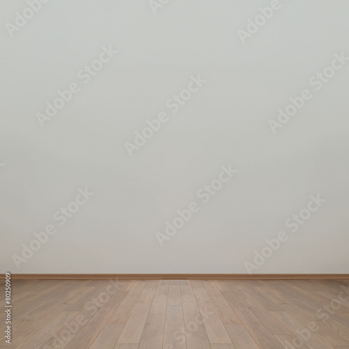 Empty wall with wooden floor