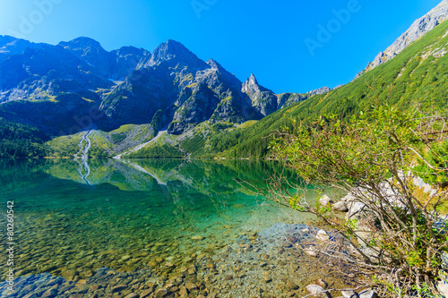 Green water mountain lake Morskie Oko, Tatra Mountains, Poland © pkazmierczak