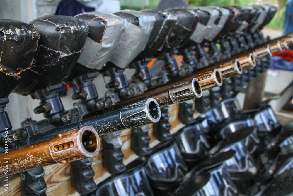 Fototapeta premium Old Paintball gun in a row.