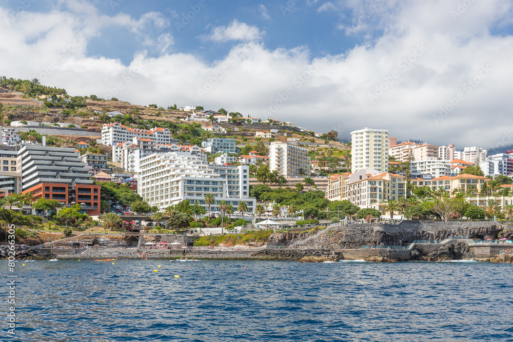 Seascape coastline Madeira Island with modern Hotels of Funchal