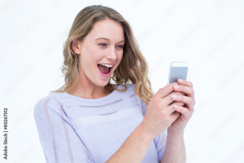Smiling woman using smartphone Smiling woman using smartphone