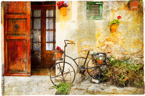 charming street in Valdemossa village with old bike photo