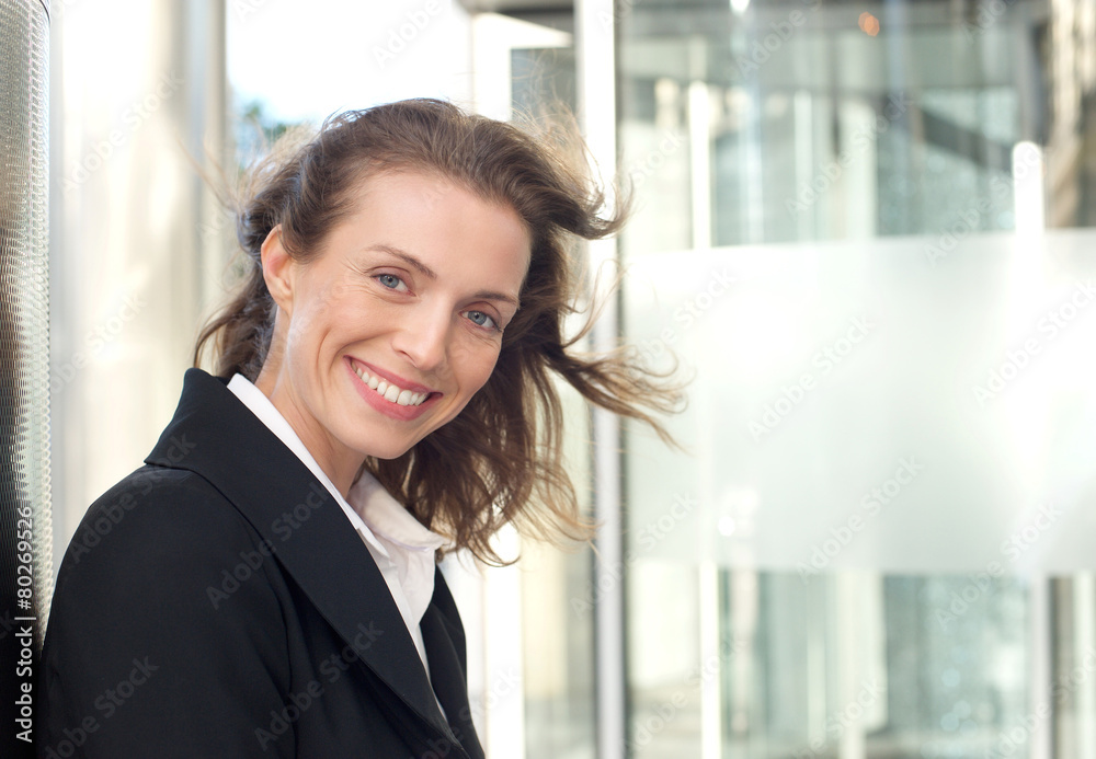 Close up portrait of a friendly business woman smiling Close up portrait of a friendly business woman smiling