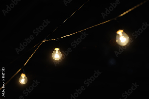 garland of lights on a dark background photo