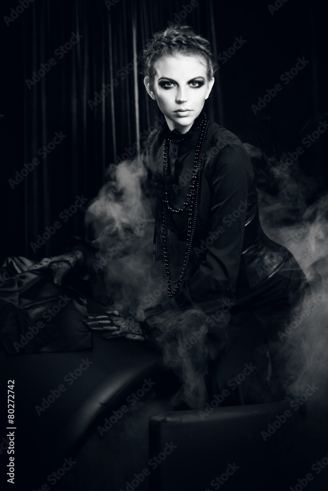 Mysterious portrait of beautiful females, girl holds a candle Mysterious portrait of beautiful females, girl holds a candle