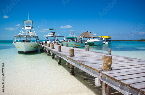 Sea boats at the Contoy island in the Caribbean sea