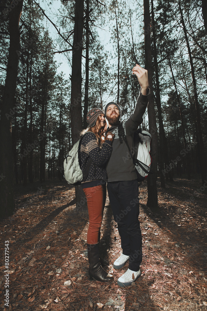 Happy young couple of tourists and taking selfie Happy young couple of tourists and taking selfie