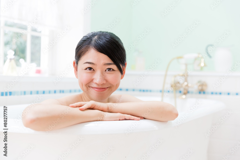 young asian woman relaxing in the bathroom young asian woman relaxing in the bathroom