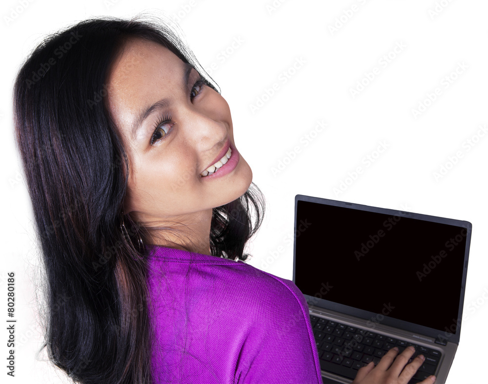 Smiling girl with laptop isolated on white Smiling girl with laptop isolated on white
